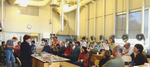 MBMAG members listen to a visiting artist lecture