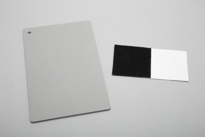 White balance neutral gray card and white cards stock with black velvet square
