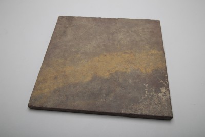 Square of colored slate to be used as a background material